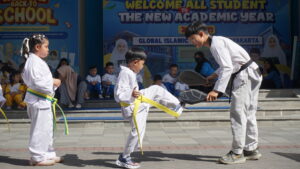 Dalam balutan baju taekwondo, siswa PG-K melakukan unjuk bakat